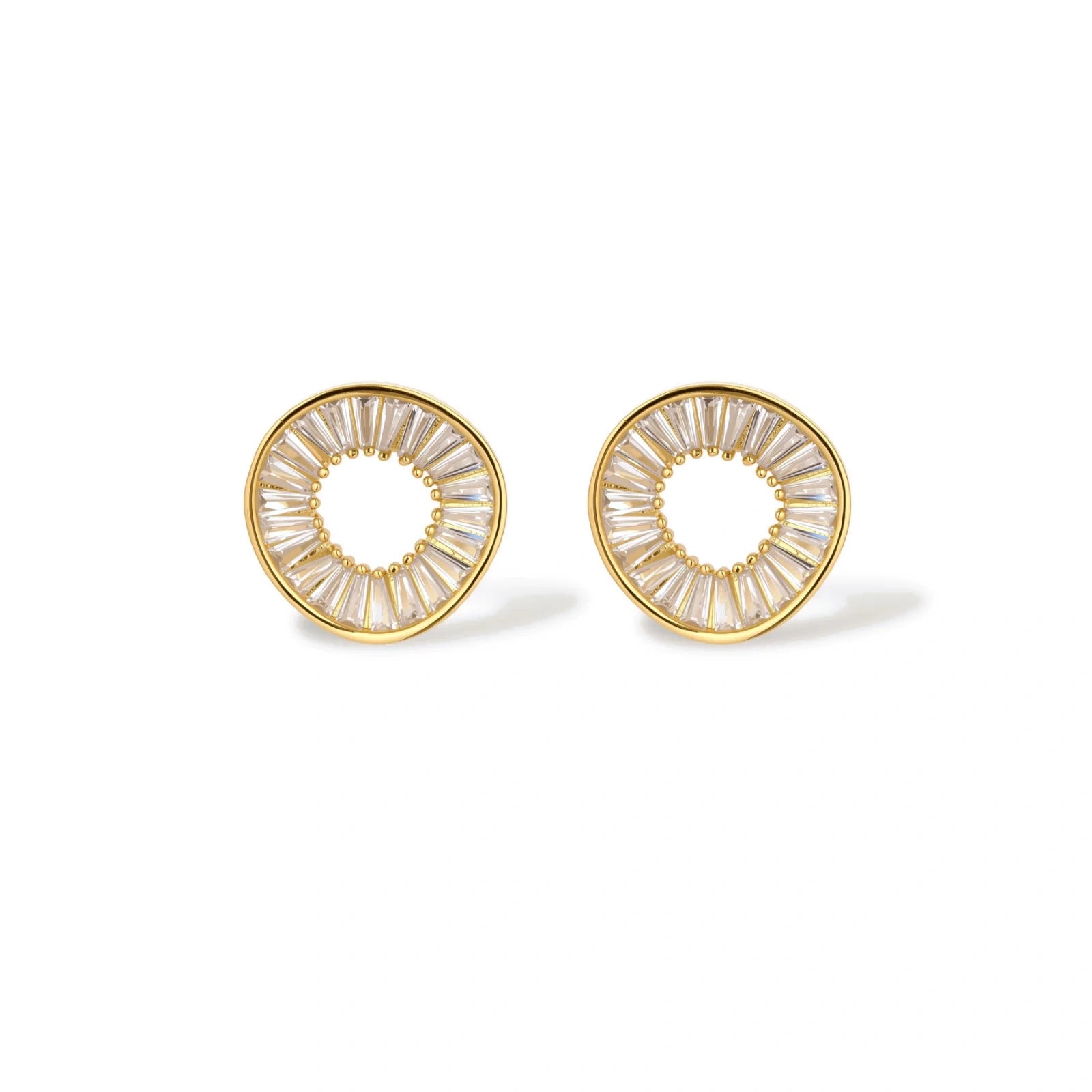Gold-plated necklace and earring set with circular CZ crystal pendants featuring radial design on cream background