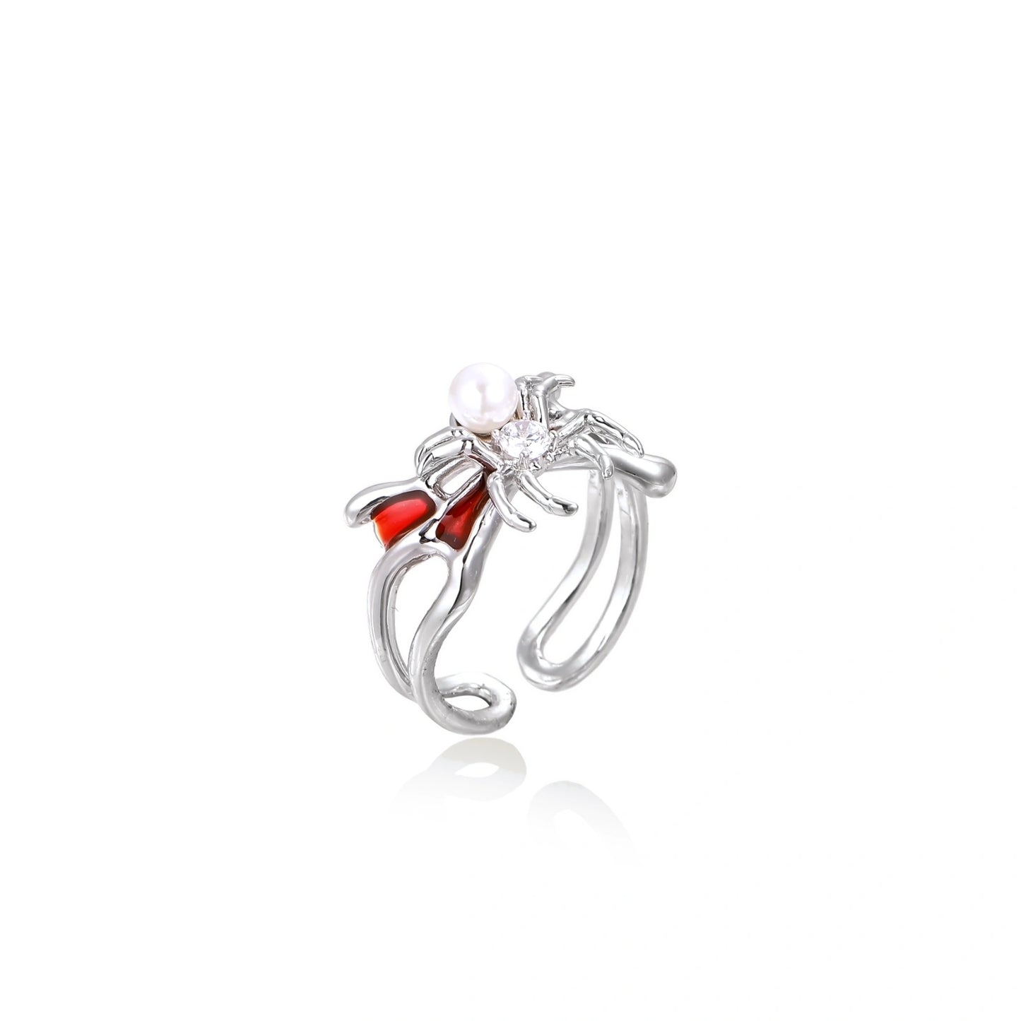 White gold plated spider ring with pearl body, clear zirconia center, and red enamel leg accents on adjustable band