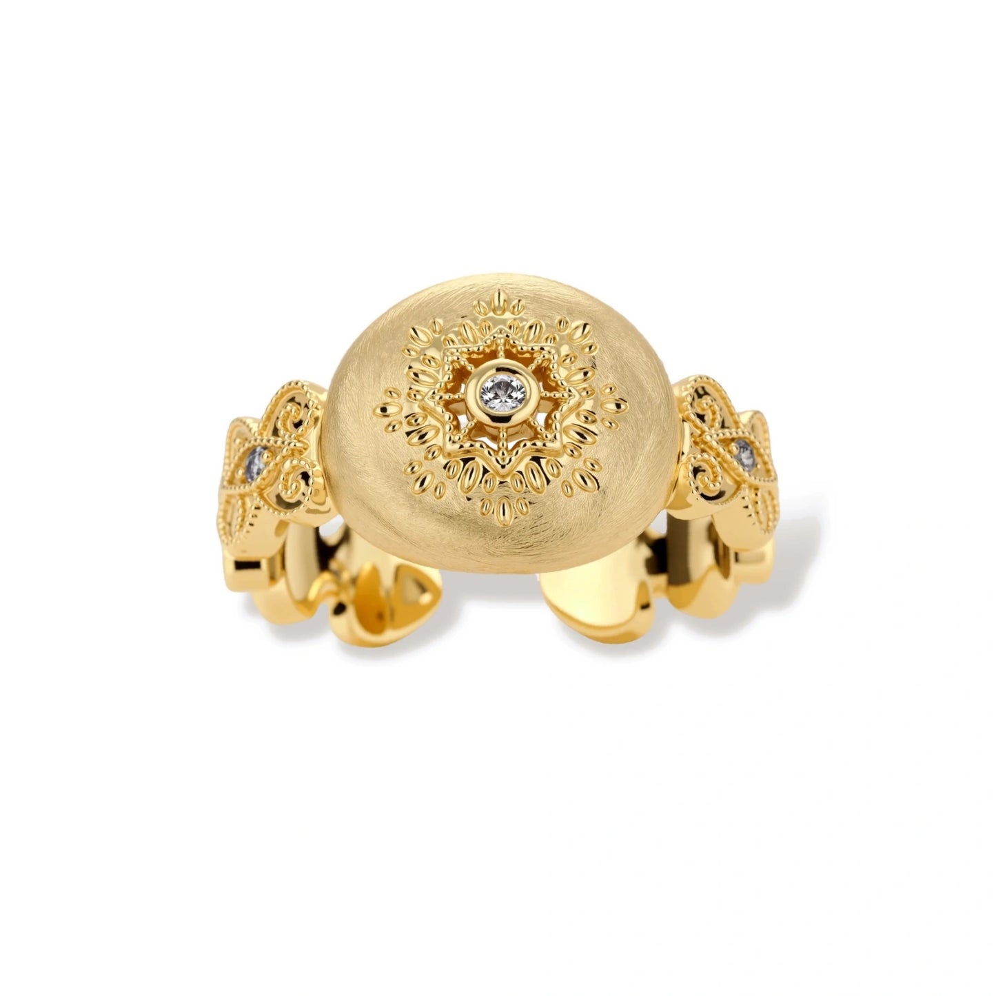 Ornate gold-plated ring with detailed engravings and central zirconia stone on adjustable band