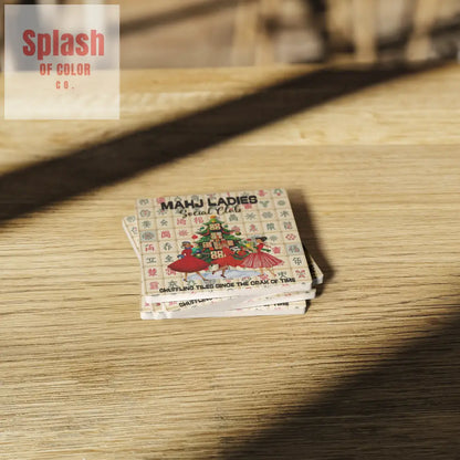 Mahjon_Holiday_Whimsical_Coasters_Mahjon_SquareStoneCoaster_WoodTable_AS_Mockup.png
