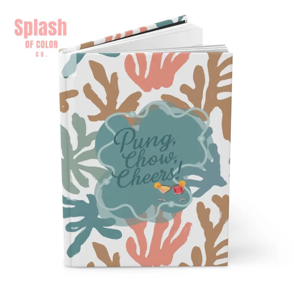 Notebook with floral design and 'Pung, Chow, Cheers!' text on a white background